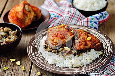 Moroccan spiced chicken with dates and aubergines Stock Photo
