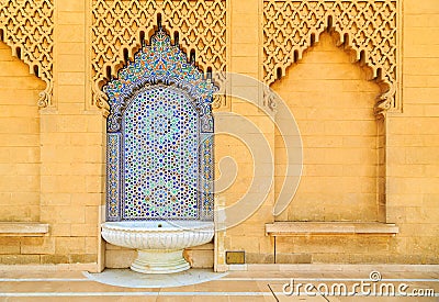 Moroccan style fountain with fine colorful mosaic tiles at the M Stock Photo