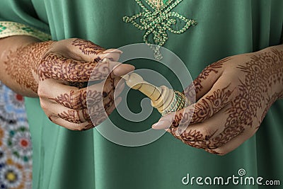 Moroccan woman with henna painted hands Stock Photo