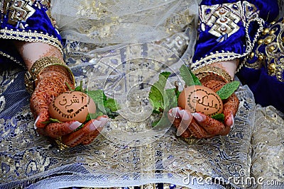 Moroccan woman with traditional henna painted hands. Stock Photo
