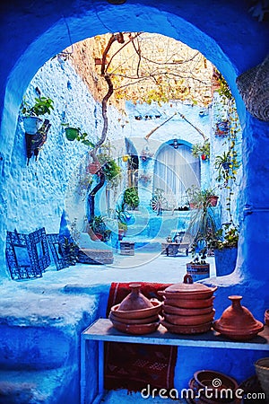 Morocco is the blue city of Chefchaouen, endless streets painted in blue color. Lots of flowers and Souvenirs in the beautiful Stock Photo