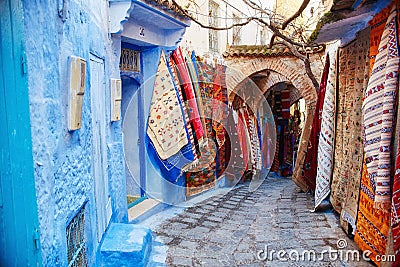 Morocco is the blue city of Chefchaouen, endless streets painted in blue color. Lots of flowers and Souvenirs in the beautiful Stock Photo