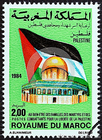 MOROCCO - CIRCA 1984: A stamp printed in Morocco shows Palestinian flag and Dome of the Rock, circa 1984. Editorial Stock Photo