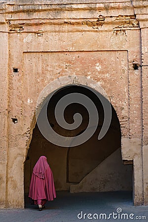 Morocco. Taroudant. A woman in a chador in the medina Editorial Stock Photo