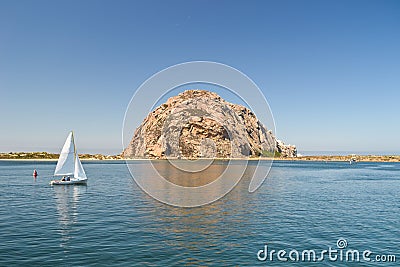 Morro Rock and sailing boat Stock Photo