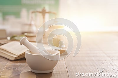 Mortar and pestle on the pharmacist`s table Stock Photo