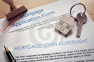 Mortgage application loan agreement and house key Stock Photo