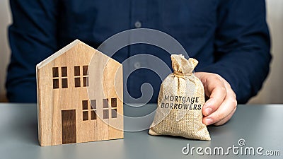 Mortgage borrowers concept. Individuals or entities who have taken out a mortgage loan from a lender to finance the purchase of a Stock Photo