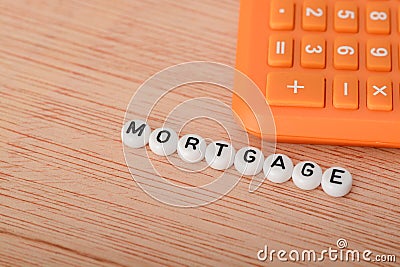 A mortgage is a financial agreement, typically a loan, used to purchase real estate, such as a home or property Stock Photo