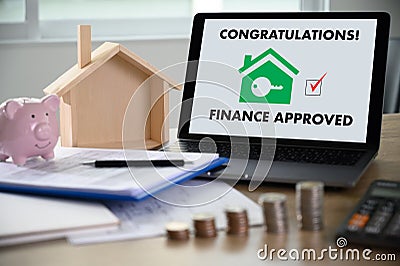 Mortgage Loan approval on mobile phone in a house contract form with approved home ownership Stock Photo