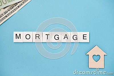 Mortgage spelled out in wooden letter tiles Stock Photo