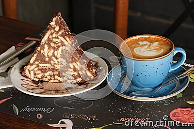 mosaic cake, Biscuit cake with chocolate, hazelnuts with coffee Stock Photo