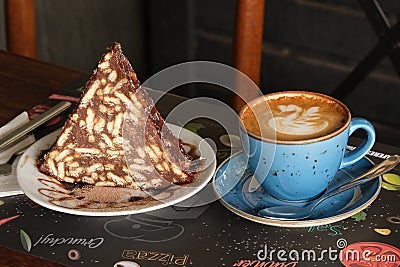 mosaic cake, Biscuit cake with chocolate, hazelnuts with coffee Stock Photo