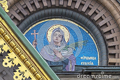 Mosaic images of saints on the walls of the Cathedral of the Savior on Spilled Blood in St. Petersburg Editorial Stock Photo