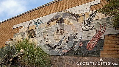 Mosaic stone mural on the front of the Herpetarium as the Dallas Zoo. Editorial Stock Photo