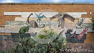 Mosaic stone mural on the front of the Herpetarium as the Dallas Zoo. Editorial Stock Photo