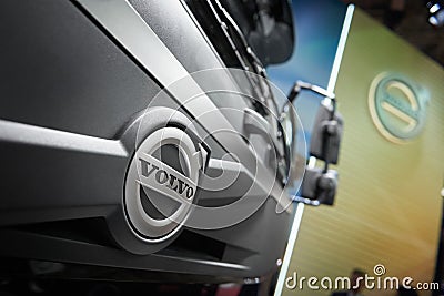 MOSCOW, APR, 18, 2018: Close up diagonal view on grey Volvo tipper truck logo on hood radiator. Swedish car logotype. Special comm Editorial Stock Photo