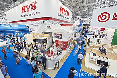 MOSCOW, AUG. 22, 2017: View on exhibition stands of car parts components details different companies. Car trucks tractors parts co Editorial Stock Photo