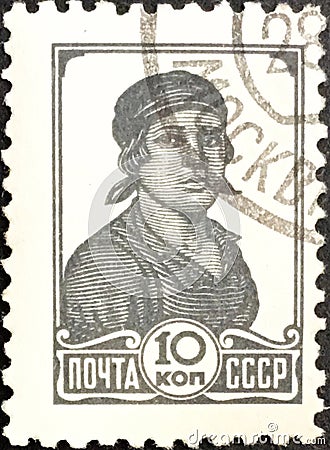 USSR Soviet Union used postage stamp depicting a Female worker Editorial Stock Photo