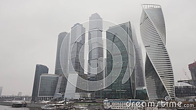 Moscow City skyscrapers in a foggy weather. Action. Amazing and unusual high rise buildings, business life of the Editorial Stock Photo