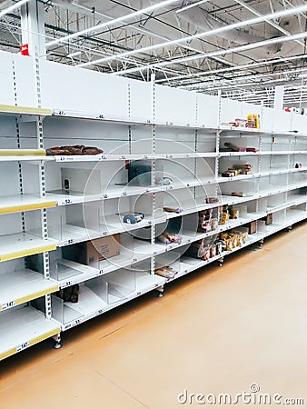 Empty shelves of the Auchan hypermarket in connection with an outbreak of coronavirus Editorial Stock Photo
