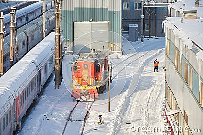 MOSCOW, FEB. 01, 2018: Winter view on railway locomotive in passenger trains depot under snow. Russian Railways snow covered train Editorial Stock Photo