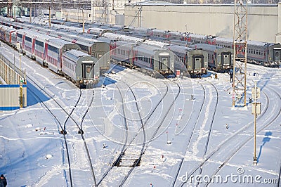 MOSCOW, FEB. 01, 2018: Winter view on railway passenger coaches cars at rail way depot under snow. Passenger trains coaches cars i Editorial Stock Photo