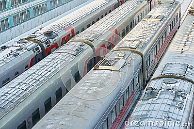 MOSCOW, FEB. 01, 2018: Winter view on railway passenger coaches cars at rail way depot under snow Passenger trains coaches cars in Editorial Stock Photo