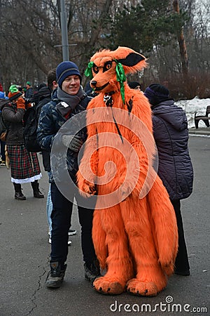 Saint Patrick`s Day celebration in Moscow. Men and women in carnival costumes Editorial Stock Photo