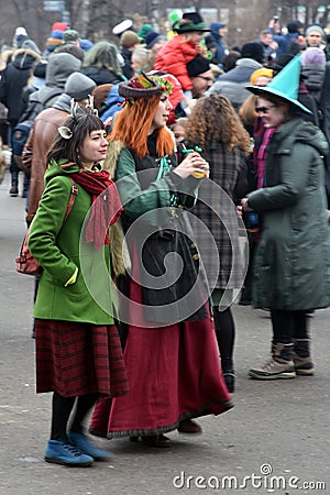 Saint Patrick`s Day celebration in Moscow. Women in carnival costume Editorial Stock Photo