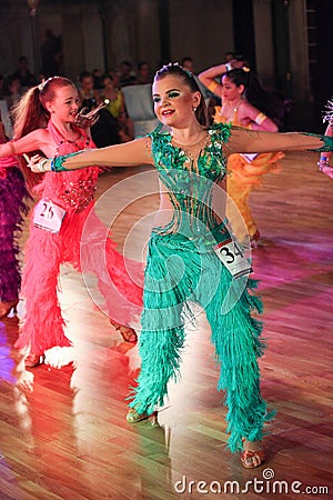 Unidentified female teens age 14-17 compete in latino dance on the Artistic Dance European Championship Editorial Stock Photo