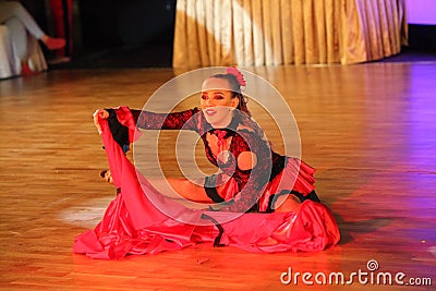 Unidentified female teens age 14-17 compete in latino dance on the Artistic Dance European Championship Editorial Stock Photo