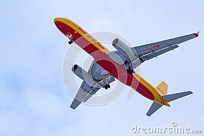 Moscow region, Russia - November 2, 2019: Close up view of yellow cargo airplane Tupolev Tu-204C DHL RA-64024 landing at Editorial Stock Photo