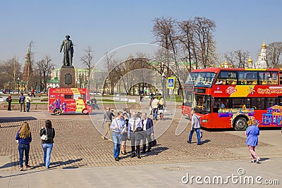 MOSCOW, RUSSIA-APRIL 19. Bus sightseeing tours on Bolotnaya Square in Moscow April 19, 2014. starting point bus, river and Editorial Stock Photo