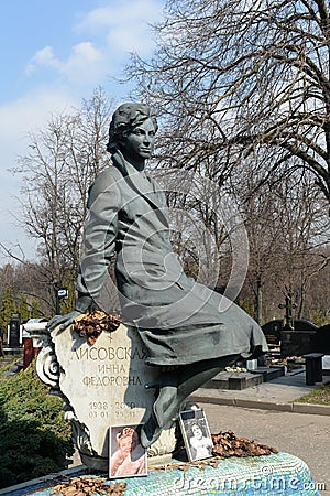 The grave of Inna Fedorovna Lisovskaya at the Troekurovsky Cemetery in Moscow Editorial Stock Photo