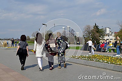 Moscow, Russia - April 30. 2018. People are walking along Cosmonauts alley in Cosmopark Editorial Stock Photo