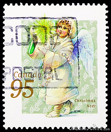Postage stamp printed in Canada shows Angel with candle, Christmas serie, circa 1999 Editorial Stock Photo