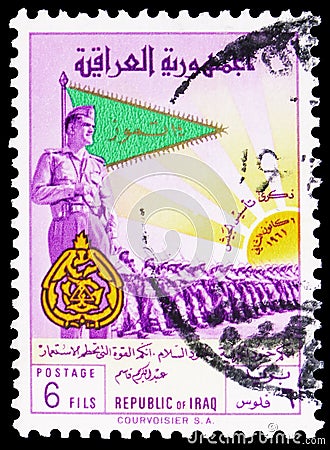 Postage stamp printed in Iraq shows General Kassem and parade of the army, Army Day serie, 6 Iraqi fils, circa 1961 Editorial Stock Photo