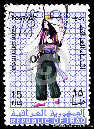 Postage stamp printed in Iraq shows Iraqi woman costume, Native costumes serie, 15 Iraqi fils, circa 1972 Editorial Stock Photo