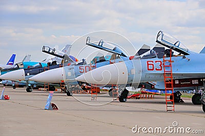 MOSCOW, RUSSIA - AUG 2015: Sukhoi fighter aircrafts presented at Editorial Stock Photo