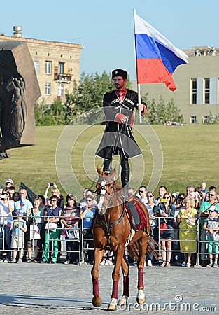 Demonstrative performance by the Kremlin Riding School on Poklonnaya Hill in honor of the Russian Flag holiday. Editorial Stock Photo