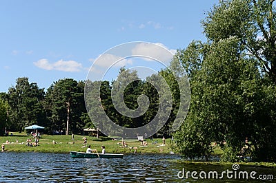 People go boating in the natural-historical park `Kuzminki-Lublino`. Editorial Stock Photo