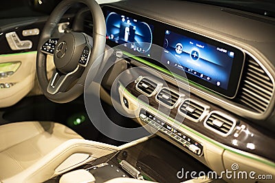 Moscow, russia - december 24, 2019: driver`s dashboard empty interior of light interior of premium SUV Mercedes GLS class night Editorial Stock Photo