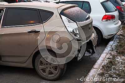 Moscow, Russia - December 29, 2019: Hyundai Solaris car after the accident crash, a broken bumper close-up. Broken Hyundai, a Editorial Stock Photo