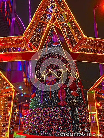 MOSCOW, RUSSIA - DECEMBER 2017: New Year 2018 and Christmas New Year`s decoration of a street in the form of a tunnel of stars Editorial Stock Photo