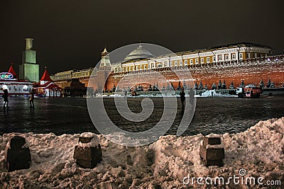 Moscow, Russia - December 2014: Reconstruction of Spasskaya Tower in scaffolding on Red Square in winter Editorial Stock Photo