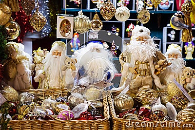 MOSCOW, RUSSIA - DECEMBER 24, 2014: Santa Claus dolls and glass Editorial Stock Photo