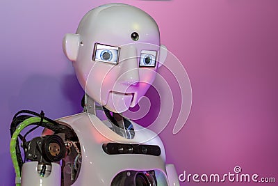 Exhibition of Robotics. Stylish handsome cyborg head / Robot Assistant with Information screen Editorial Stock Photo