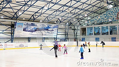 Moscow - February 09, 2019. Training of group of little girls at indoor rink Editorial Stock Photo