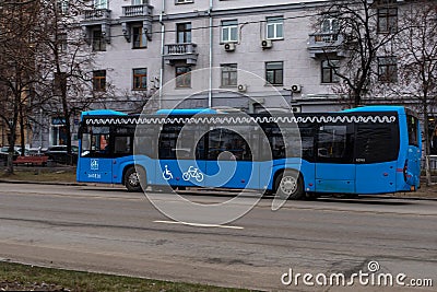 Moscow, Russia - January 7, 2020: Moscow city transport blue, public bus on a city street. Big blue bus with Mosgortrans logo Editorial Stock Photo